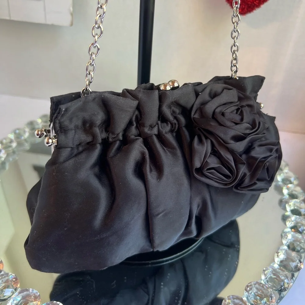 White House black market Chic Black Satin Clutch with Rosette Accent